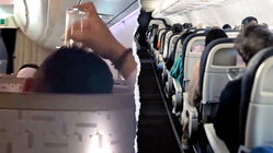 Passenger's bizarre use of drinking glass on flight leaves travelers horrified Education NT
